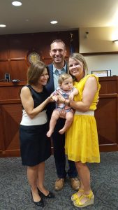 Family at adoption day standing with Susanne Cetrulo